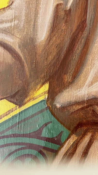 Paint layer cross-section showing historic abrasion and thinning
