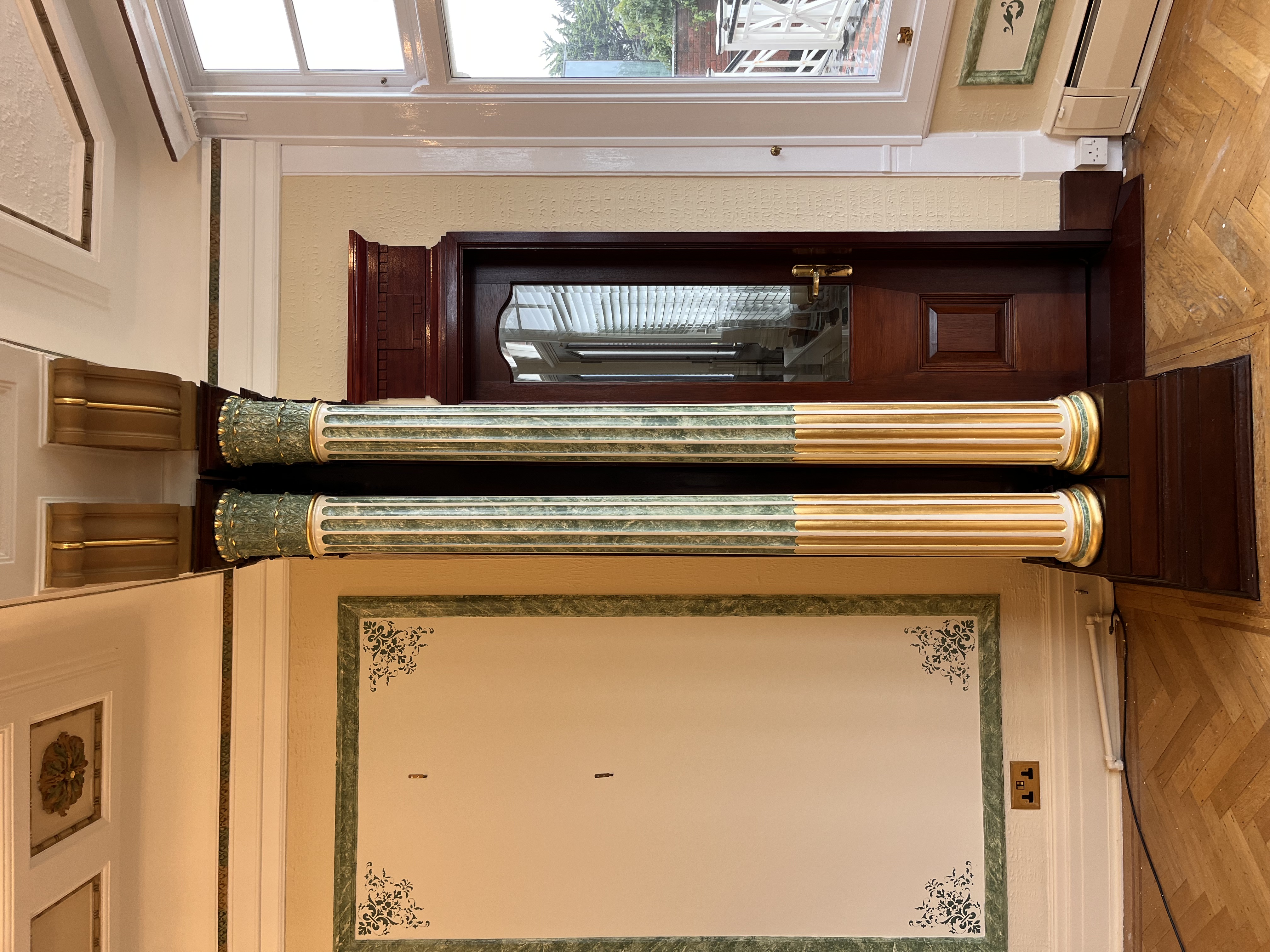 Columns gilded in Victorian mansion