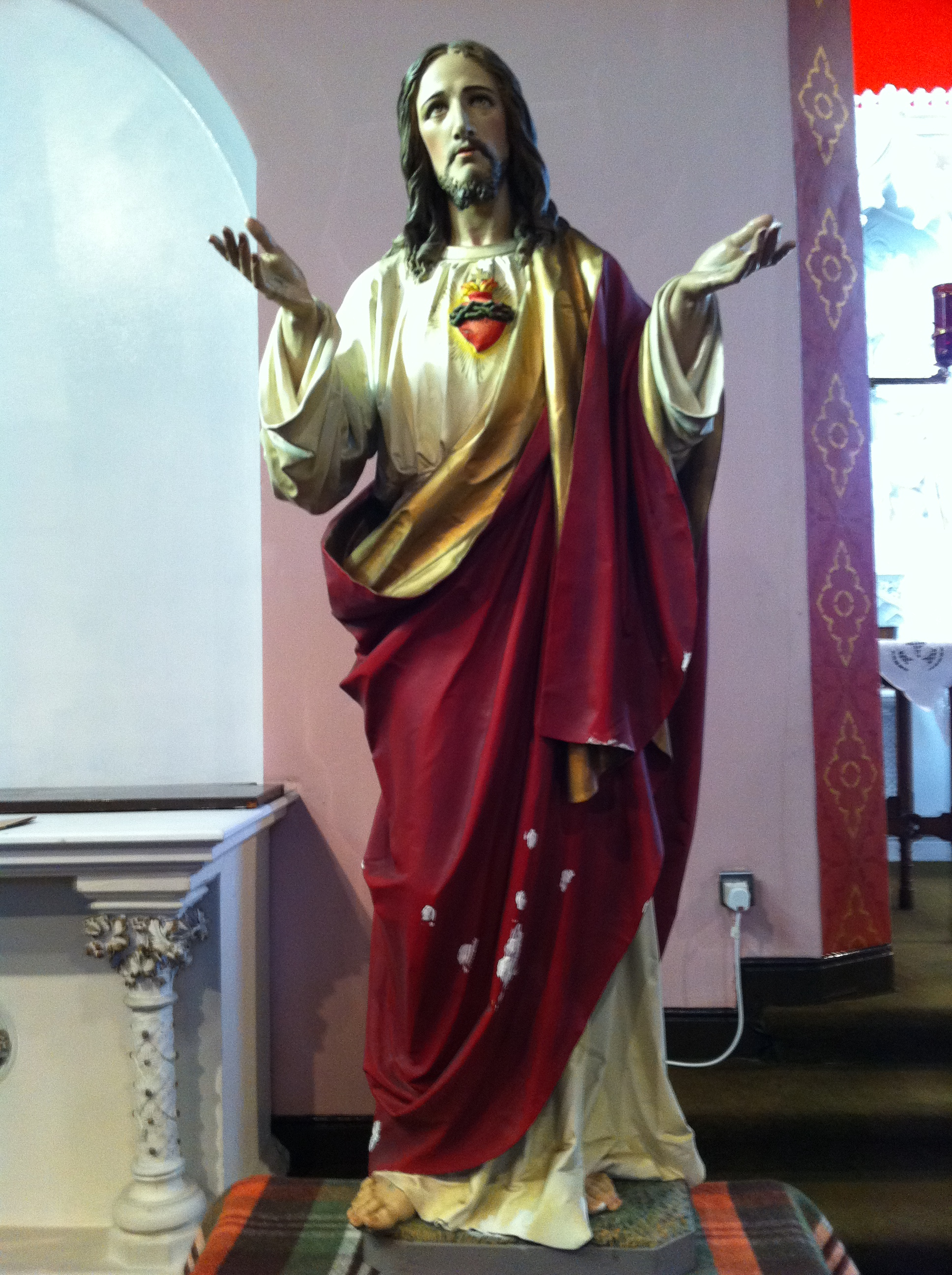 Conservation of wooden ecclesiastic statue before treatment