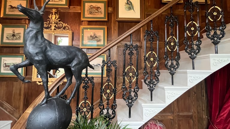 Gilding detail on staircase spindles in an 1800s country cottage