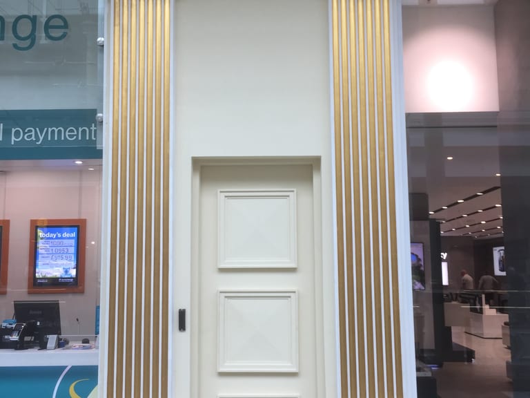 Gold leaf on decorative columns at the Trafford Centre