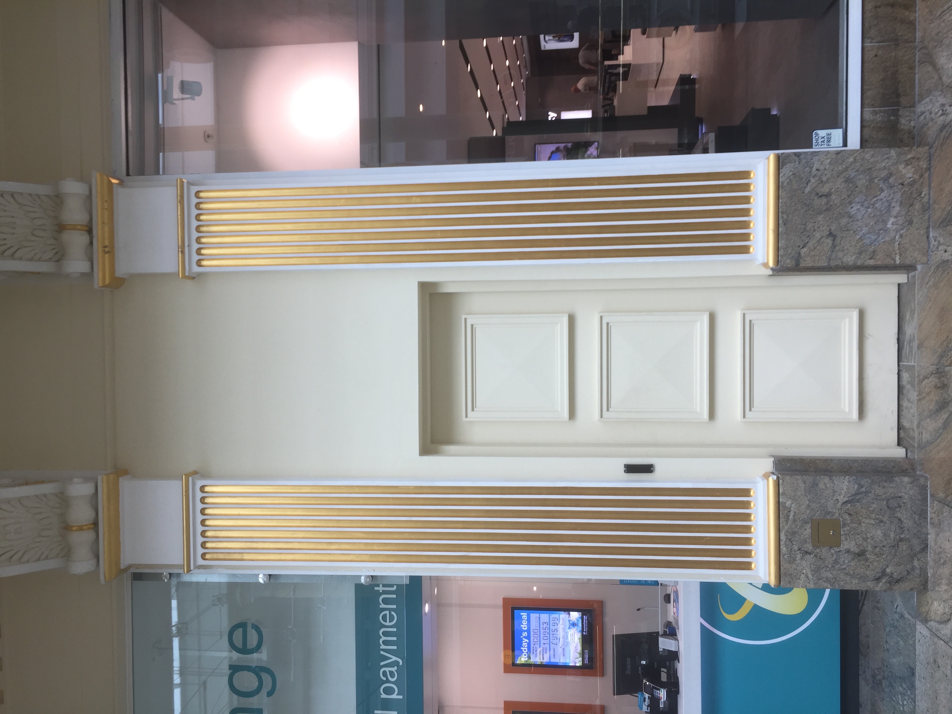 Water gilding on decorative ceiling mouldings in a Liverpool heritage building — North West Murals Ltd, Manchester