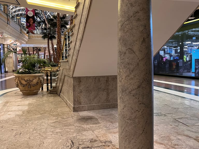 Grey granite faux finish on columns at the Trafford Centre