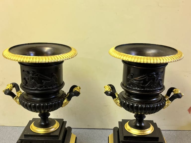 Pair of Victorian urns regilded with gold leaf